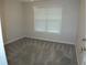 Bedroom with gray carpet and window at 100 Meadow Lake Dr, Carrollton, GA 30116
