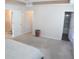 Main bedroom with carpet, access to bathroom and closet at 100 Meadow Lake Dr, Carrollton, GA 30116