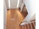 Hardwood floors and staircase in the home's entryway at 100 Meadow Lake Dr, Carrollton, GA 30116