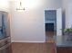 Kitchen with view into living room and hardwood floors at 100 Meadow Lake Dr, Carrollton, GA 30116