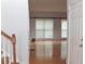 Hardwood floor living room with large windows at 100 Meadow Lake Dr, Carrollton, GA 30116
