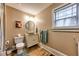 Simple bathroom with updated vanity and tile floor at 107 Howard Ne St, Atlanta, GA 30317