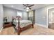 Bright bedroom with ceiling fan and floral bedding at 107 Howard Ne St, Atlanta, GA 30317