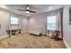 Charming bedroom with neutral walls, carpet, and crib at 107 Howard Ne St, Atlanta, GA 30317