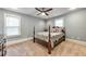 Serene bedroom with ceiling fan and carpet flooring at 107 Howard Ne St, Atlanta, GA 30317