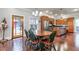 Open dining area with hardwood floors and access to the kitchen at 107 Howard Ne St, Atlanta, GA 30317