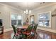 Bright dining area with hardwood floors and a wooden table at 107 Howard Ne St, Atlanta, GA 30317