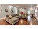 Spacious living room featuring hardwood floors and a comfortable sectional sofa at 107 Howard Ne St, Atlanta, GA 30317