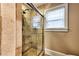 Updated shower with glass enclosure and tile surround at 107 Howard Ne St, Atlanta, GA 30317