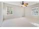 Bright bedroom featuring carpet and ceiling fan at 1883 Acuba Ln, Atlanta, GA 30345