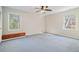 Bedroom with carpet, ceiling fan and large windows at 1883 Acuba Ln, Atlanta, GA 30345