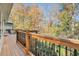 Deck overlooking wooded backyard with wooden railing at 1883 Acuba Ln, Atlanta, GA 30345