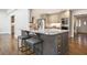 Kitchen island with granite countertop and seating for two at 1883 Acuba Ln, Atlanta, GA 30345