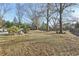 Large backyard with mature trees and plenty of space at 632 Graymont Dr, Grayson, GA 30017