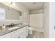 Clean bathroom with granite countertop and white vanity at 632 Graymont Dr, Grayson, GA 30017