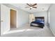 Spacious bedroom with a comfy bed and plenty of natural light at 632 Graymont Dr, Grayson, GA 30017