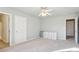 Well-lit bedroom with ample space and neutral colors at 632 Graymont Dr, Grayson, GA 30017