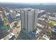 High-rise residential building with city backdrop at 325 E Paces Ferry Rd # 2003, Atlanta, GA 30305