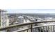 Scenic view from the balcony of a building, showing the surrounding cityscape and lush green landscape at 325 E Paces Ferry Rd # 2003, Atlanta, GA 30305