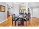 Charming dining area with hardwood floors adjacent to an open kitchen concept at 325 E Paces Ferry Rd # 2003, Atlanta, GA 30305
