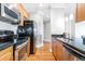 Modern kitchen with stainless steel appliances and granite countertops at 325 E Paces Ferry Rd # 2003, Atlanta, GA 30305