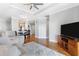 Inviting living room with a view to an open kitchen with hardwood floors and neutral decor at 325 E Paces Ferry Rd # 2003, Atlanta, GA 30305