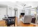 Cozy living room featuring hardwood floors, a ceiling fan, and neutral decor at 325 E Paces Ferry Rd # 2003, Atlanta, GA 30305