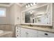 Elegant bathroom with granite countertop and white cabinets at 109 Slate Dr, Buford, GA 30518