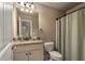 Bathroom with granite countertop, shower, and toilet at 109 Slate Dr, Buford, GA 30518