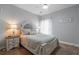 Charming bedroom with a queen-size bed and nightstands at 109 Slate Dr, Buford, GA 30518