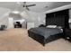 Main bedroom with king-size bed and an office area at 109 Slate Dr, Buford, GA 30518