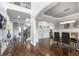 Bright dining room with hardwood floors and a view of the entryway at 109 Slate Dr, Buford, GA 30518