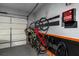 Garage with multiple bikes on wall mount at 109 Slate Dr, Buford, GA 30518