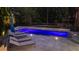 Luxury pool with patio and lounge chairs, surrounded by a fence and landscaping at 109 Slate Dr, Buford, GA 30518