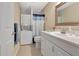 Clean bathroom featuring a shower and tub combo, vanity, and toilet at 1800 Clairmont Lk # A-519, Decatur, GA 30033