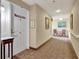 Building hallway with carpet and artwork at 1800 Clairmont Lk # A-519, Decatur, GA 30033