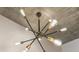 Modern multi-light chandelier with exposed bulbs at 250 Pharr Rd # 1516, Atlanta, GA 30305