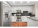 Modern kitchen with stainless steel appliances at 250 Pharr Rd # 1516, Atlanta, GA 30305