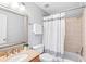 Simple bathroom with a shower/tub and updated fixtures at 665 Windsor Sw St, Atlanta, GA 30310