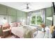 Serene bedroom featuring a tranquil color palette and ample window light at 665 Windsor Sw St, Atlanta, GA 30310