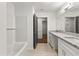 Updated bathroom, featuring a granite double vanity at 263 Weldon Rd, Palmetto, GA 30268