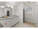 Updated bathroom with granite vanity and large mirror at 263 Weldon Rd, Palmetto, GA 30268