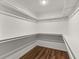 Large walk-in closet with double hanging rods and shelving at 263 Weldon Rd, Palmetto, GA 30268