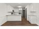 Modern kitchen featuring stainless steel appliances and granite countertops at 263 Weldon Rd, Palmetto, GA 30268