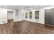 Bright living room with hardwood floors and built-in shelving at 263 Weldon Rd, Palmetto, GA 30268