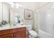 Bathroom with a shower/tub combo and wood vanity at 3200 Saute Way, Avondale Estates, GA 30002