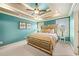 Primary bedroom with a large bed and ceiling fan at 3200 Saute Way, Avondale Estates, GA 30002