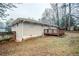 Brick house with a wooden deck and fenced backyard at 3743 Turner Heights Dr, Decatur, GA 30032