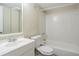Clean bathroom with white tile and bathtub at 3743 Turner Heights Dr, Decatur, GA 30032