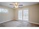 Bedroom with carpet, ceiling fan and French doors at 3743 Turner Heights Dr, Decatur, GA 30032